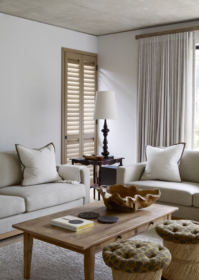 Timber Plantation Shutters in a neutral-toned living room