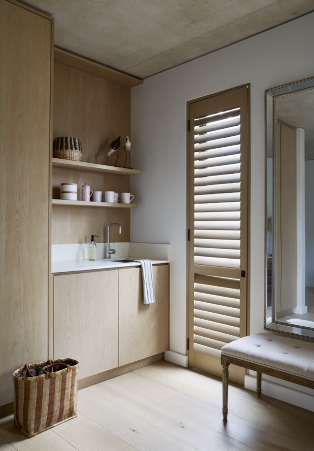 Timber shutter door in a light-filled scullery